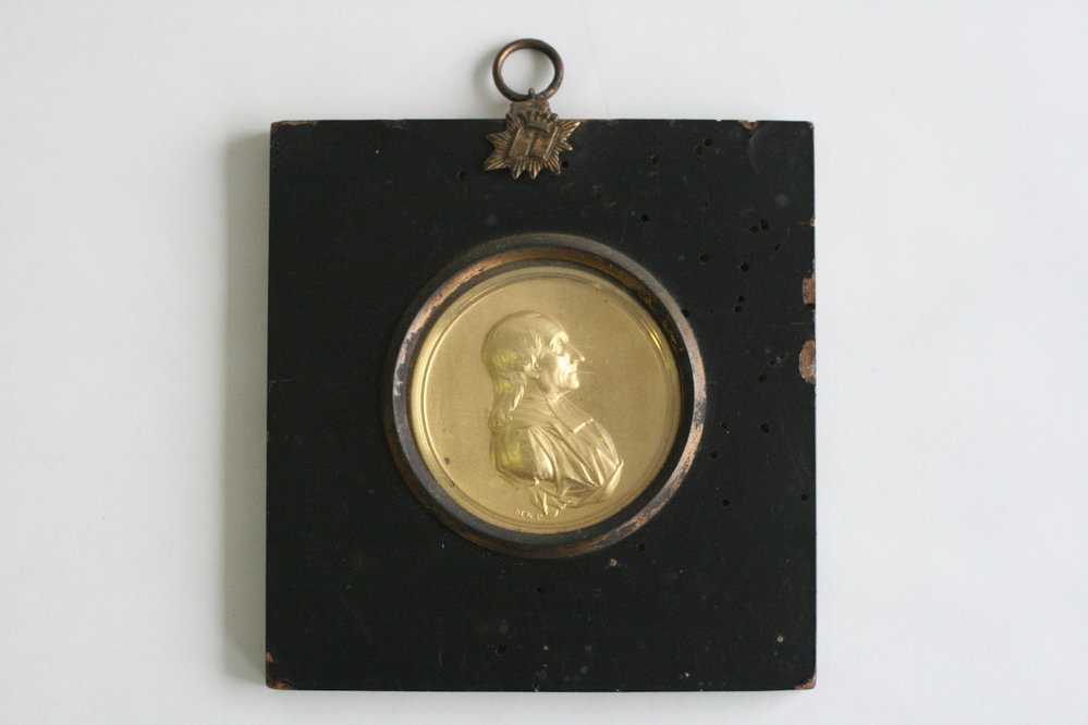 John William Circular gold raised portrait
