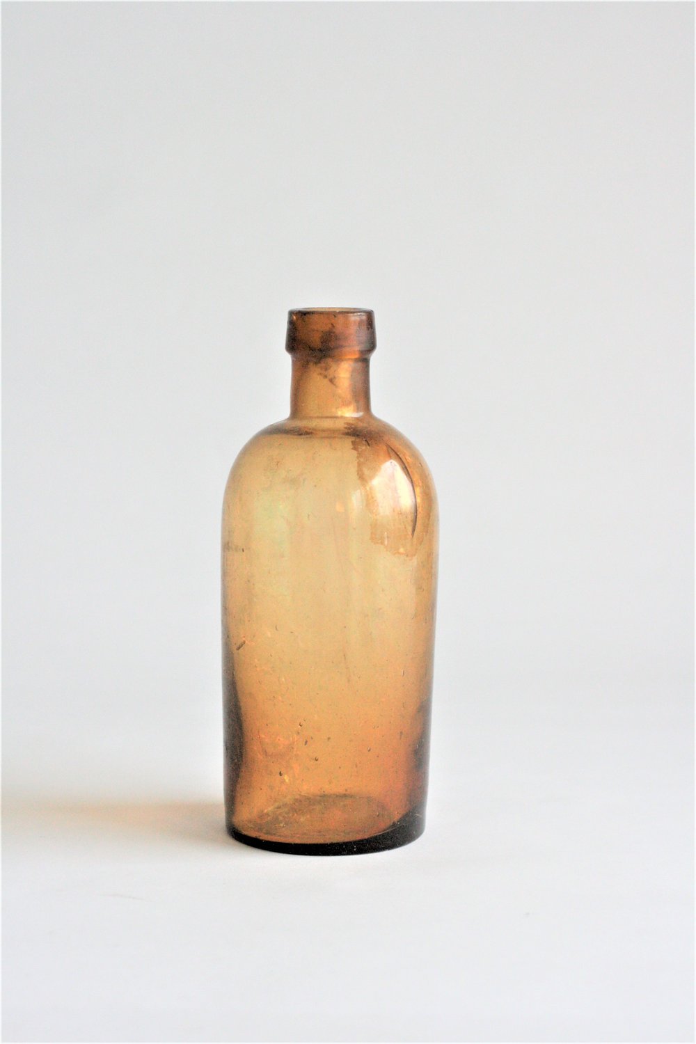 Small Yellow Glass Bottle