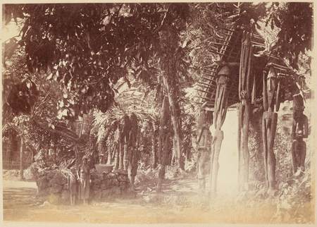 Island location scene with carved figures