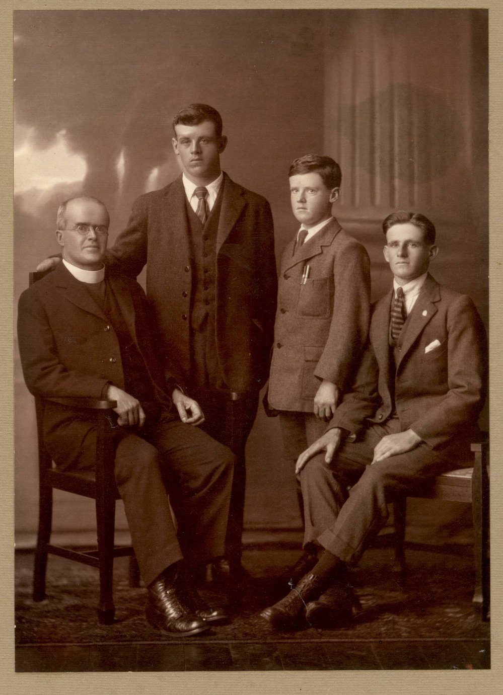 The Reverend John Patteson Cowie, second son of Bishop William Garden Cowie, with his three sons