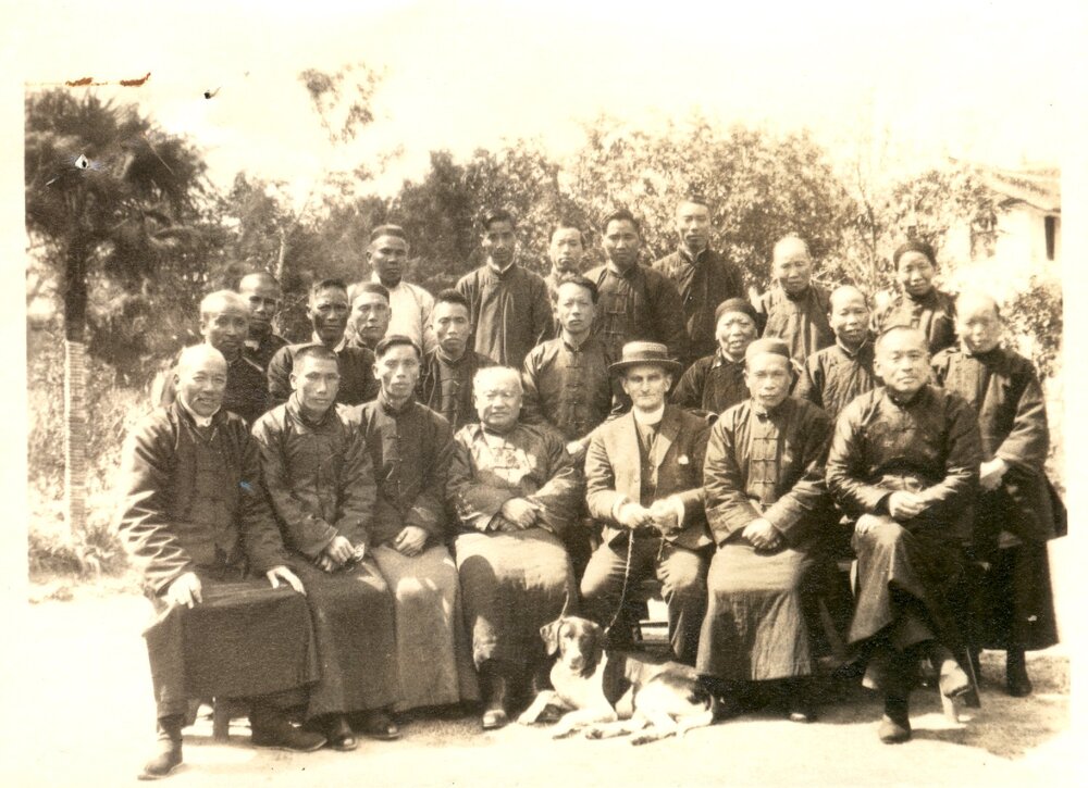      China Mission Group portrait. (on back: Rev N.T. Shin, Bishop Sing).