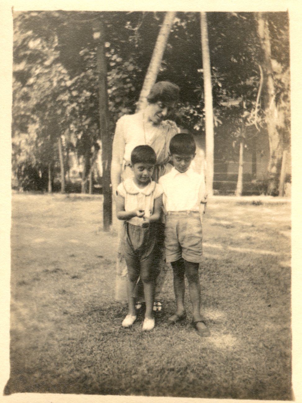 One woman with 2 Indian boys. 