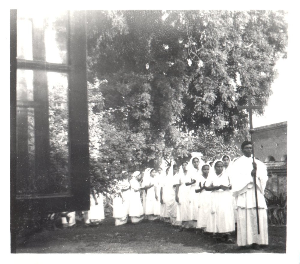 Nurses led by priest