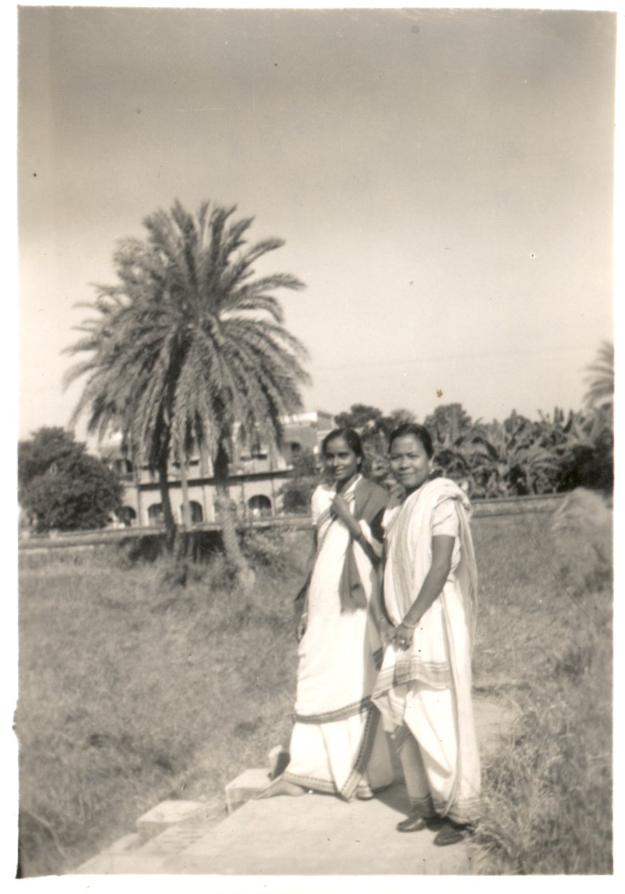 Two women on an outside path