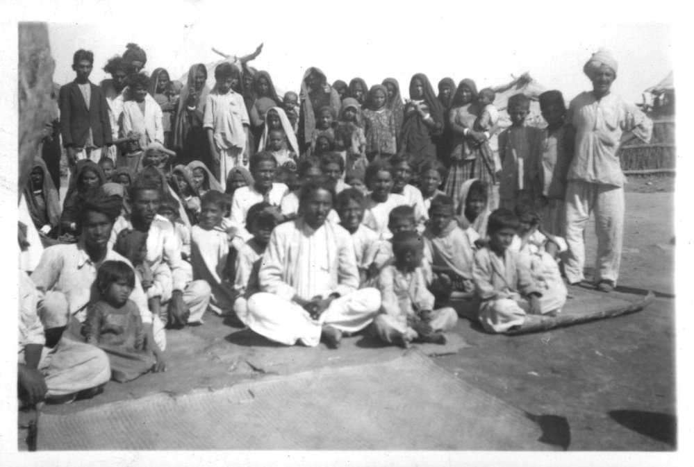 Large group of newly baptised Christians. 