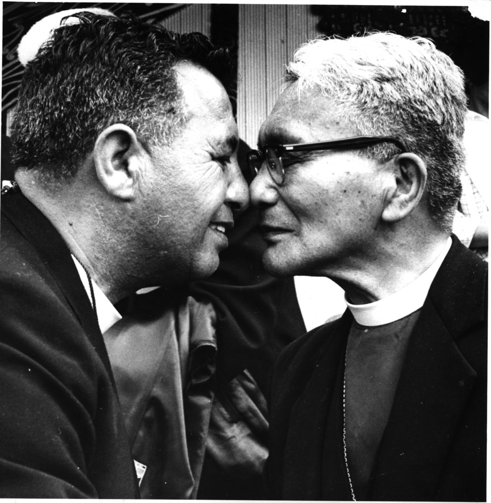 Bishop Manuhuia Bennett and Bishop Wiremu Panapa hongi at an unknown occasion.