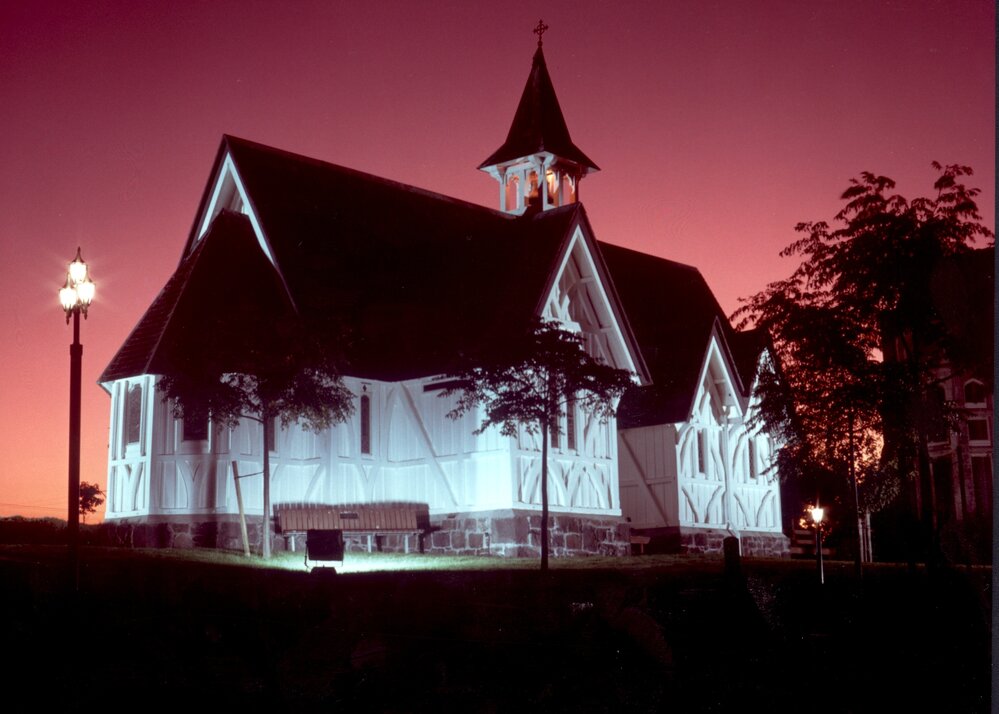 St.John's College chapel at night against a red sky
