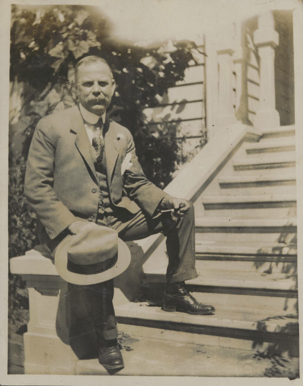 Unknown male on steps possibly outside Hukarere School