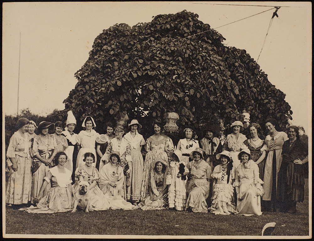 Women in period costumes