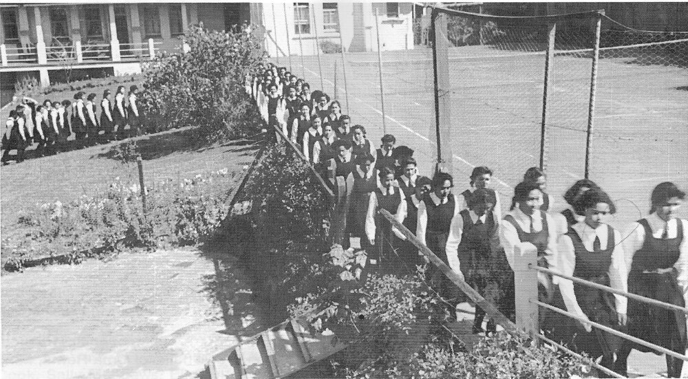 Hukarere students walking in two's along the school paths