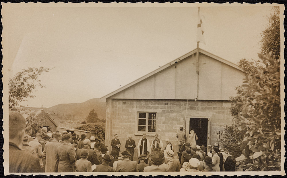 Bishop John Holland at the opening or blessing of a concrete block building