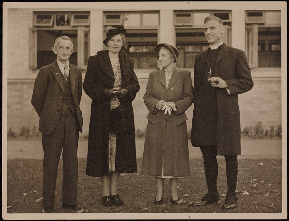 Group portrait of Blair Whyte (Diocesan Secretary, Mrs Thora Holland, Miss Fitchett (Head, Waikato Diocesan School), Bishop John T Holland