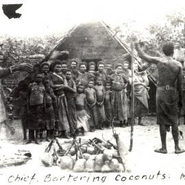 Chief bartering coconuts, Mota