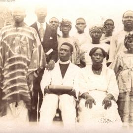 The Rev'd and Mrs Akingbehin and the school master Mr Imukode, Ora District West Africa