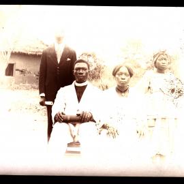 Mr isa Imkode and the Rev'd and Mrs FC Akingbeham and a pupil teacher