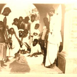 Group of Indian people, in an arch way. 