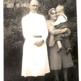 Man, woman and child, in Darjeling. October 1948. 