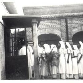 Nurses going into bulding. 