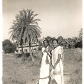 Two women on an outside path