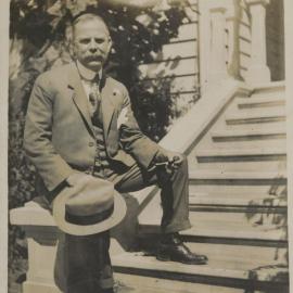 Unknown male on steps possibly outside Hukarere School