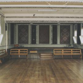 Interior of a a hall or room at Napier Terrace showing Maori panelling