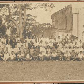 Group outside of the partially complete Holy Trinity Cathedral, Suva