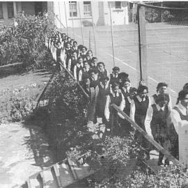 Hukarere students walking in two's along the school paths