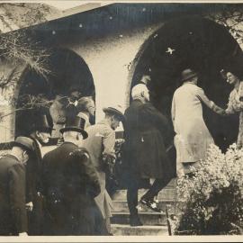 Display copy print on card, with annotation – ‘ Garden party at the first Bishopscourt … General Synod in 1937. The guests are being received by Bishop and Mrs Cherrington’.