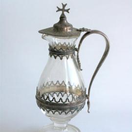 Large glass and metal jug