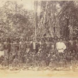 Group of Melanesians in Front of Trees