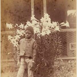 Young Melanesian Lad Standing Outside a House Norfolk Island
